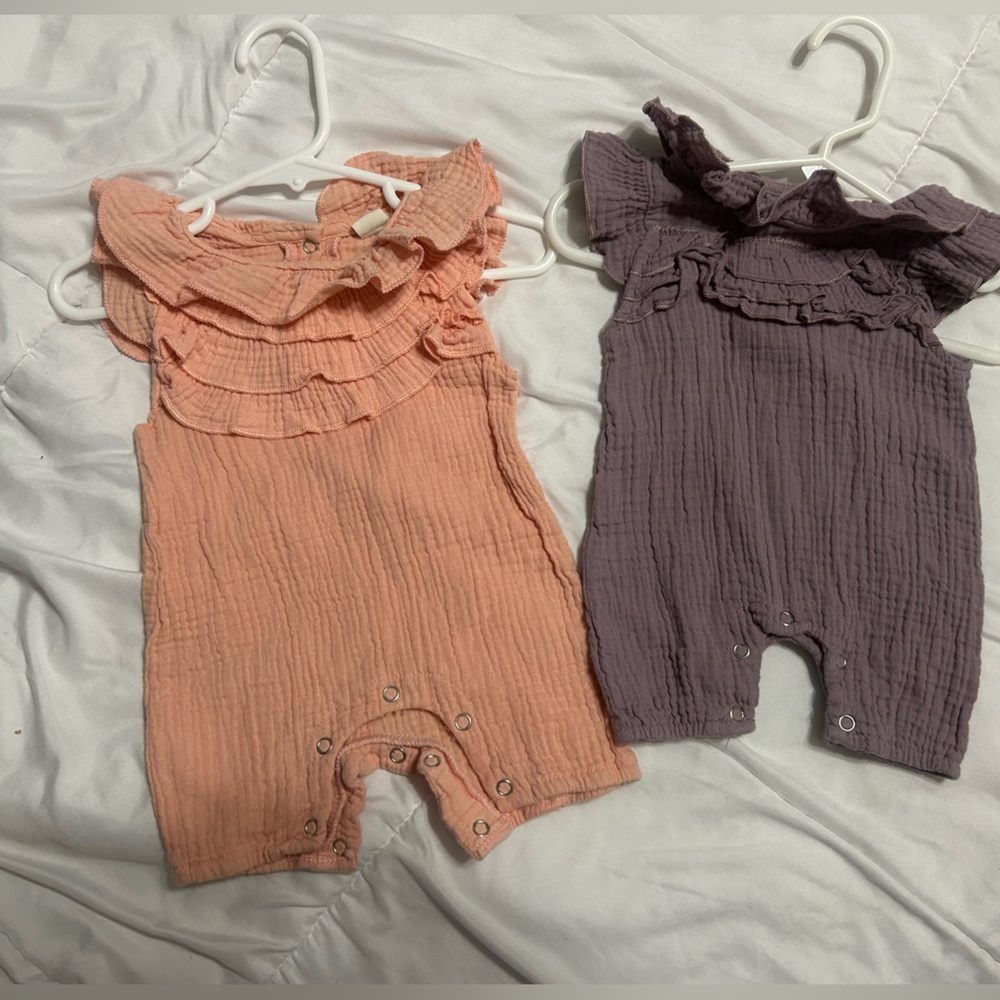 2 pair NBW muslin rompers. 70. Purple and Orange. Snap enclosure, back & bottom.
